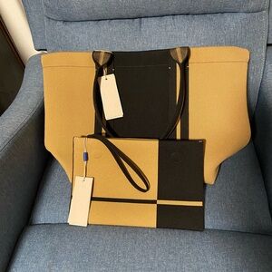 Rothy's essential tote and pouch in camel and black with magnets